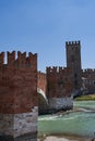 View of the Castel Vecchio Bridge connected to Castelvecchio Castle along Adige river in Verona, Italy - July, 2022 Royalty Free Stock Photo